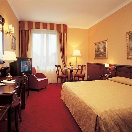 Atahotel Executive Milão Quarto foto