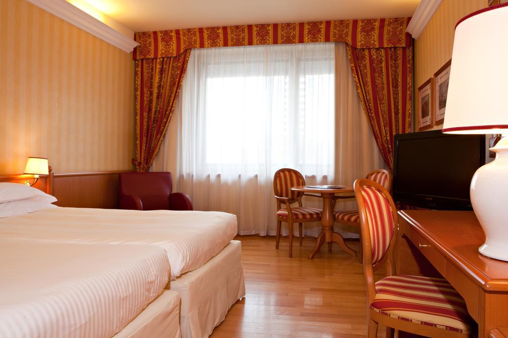 Atahotel Executive Milão Quarto foto